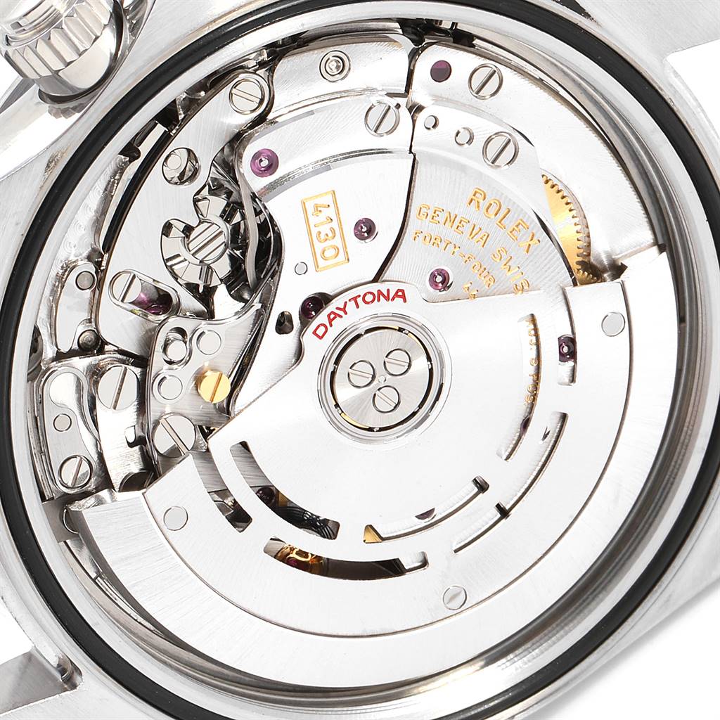 The image shows a close-up, angled view of the Rolex Daytona 116520 Men's Stainless Steel White Dial 116520 Men's Stainless Steel White Dial watch movement and internal mechanism.