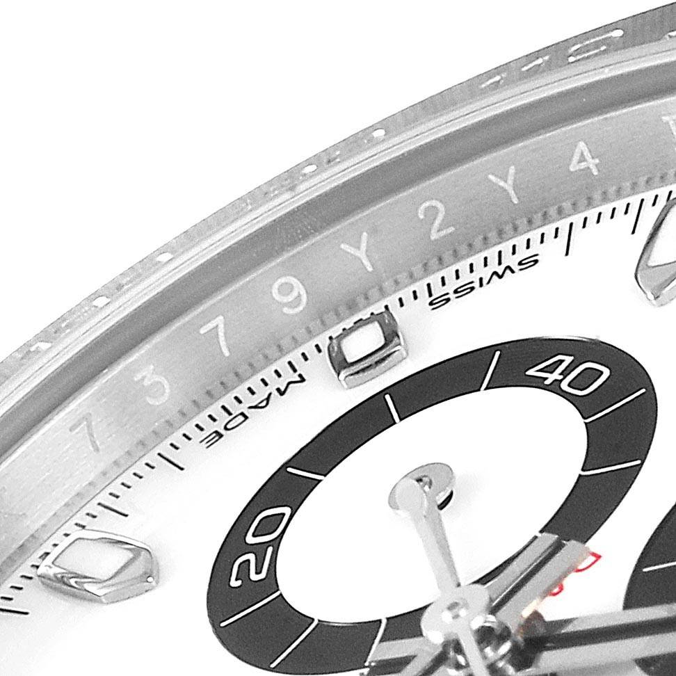 The image shows a close-up of the bezel, subdial, and markers of a Rolex Daytona 116500 Men's Stainless Steel White Dial 116500 Men's Stainless Steel White Dial watch.