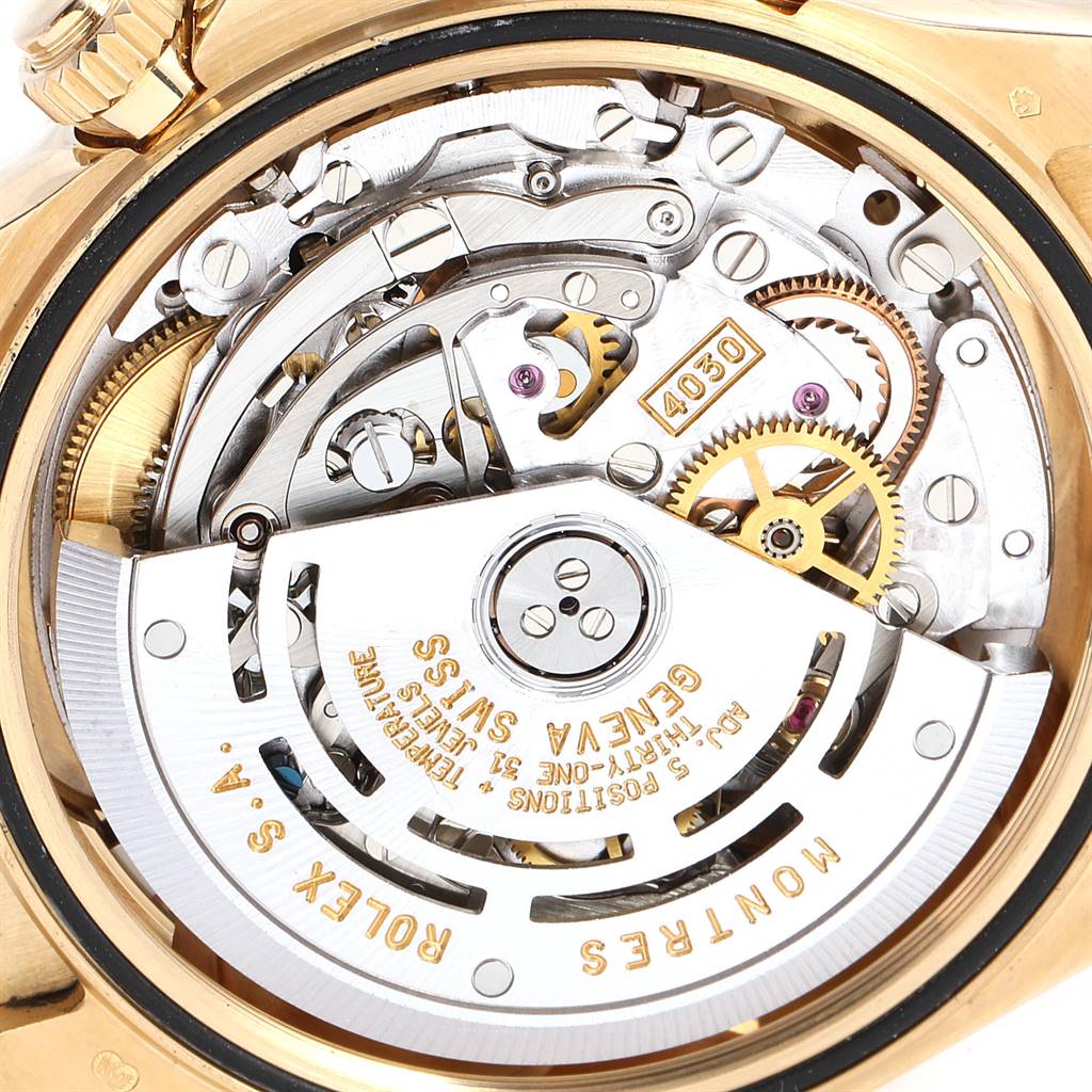 This image shows a close-up view of the movement and internal mechanism of a Rolex Daytona 16518 Men's Yellow Gold White Dial 16518 Men's Yellow Gold White Dial watch.