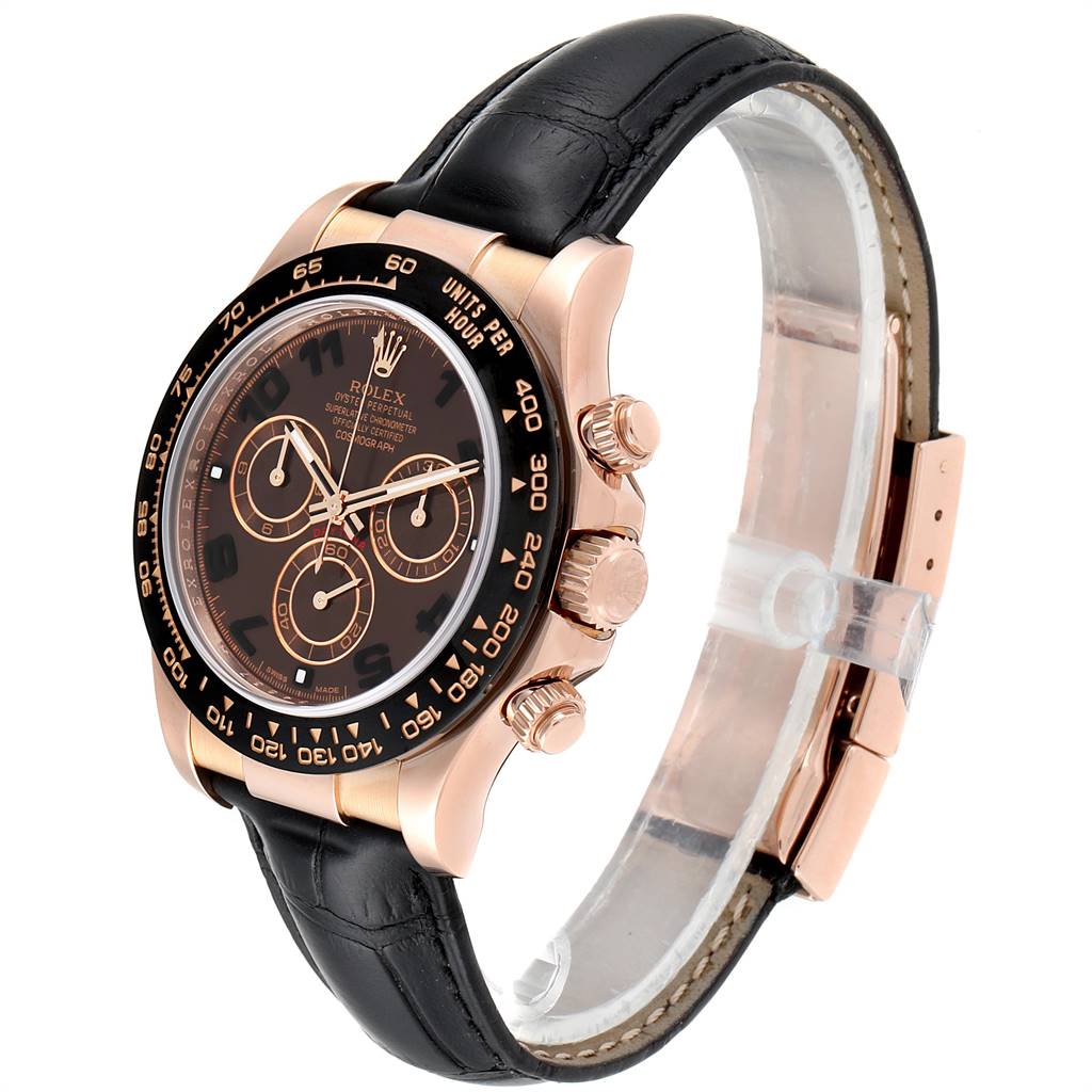 This image shows a Rolex Daytona 116515LN Men's Rose Gold Brown Dial 116515LN Men's Rose Gold Brown Dial watch from a slight angled view, highlighting its face, bezel, crown, pushers, and black leather strap.