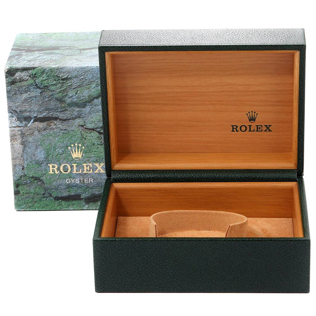 The image shows an open Rolex Daytona 116520 Men's Stainless Steel White Dial 116520 Men's Stainless Steel White Dial watch box, displaying its wooden interior and the Rolex branded exterior packaging.