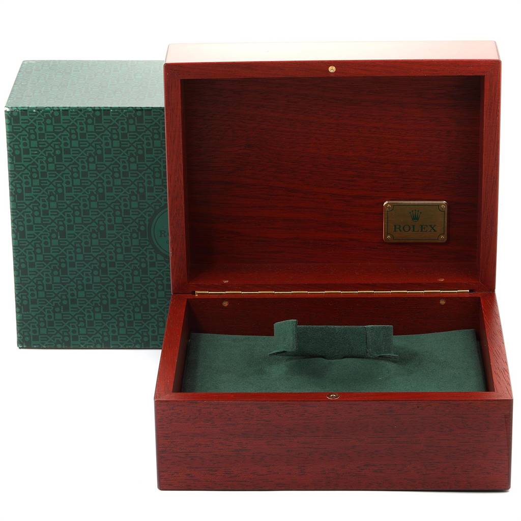 The image shows an open Rolex Daytona 116523 Men's Steel and Gold (two tone) Black Dial 116523 Men's Steel and Gold (two tone) Black Dial watch box made of polished wood with green interior lining and a protective outer box.