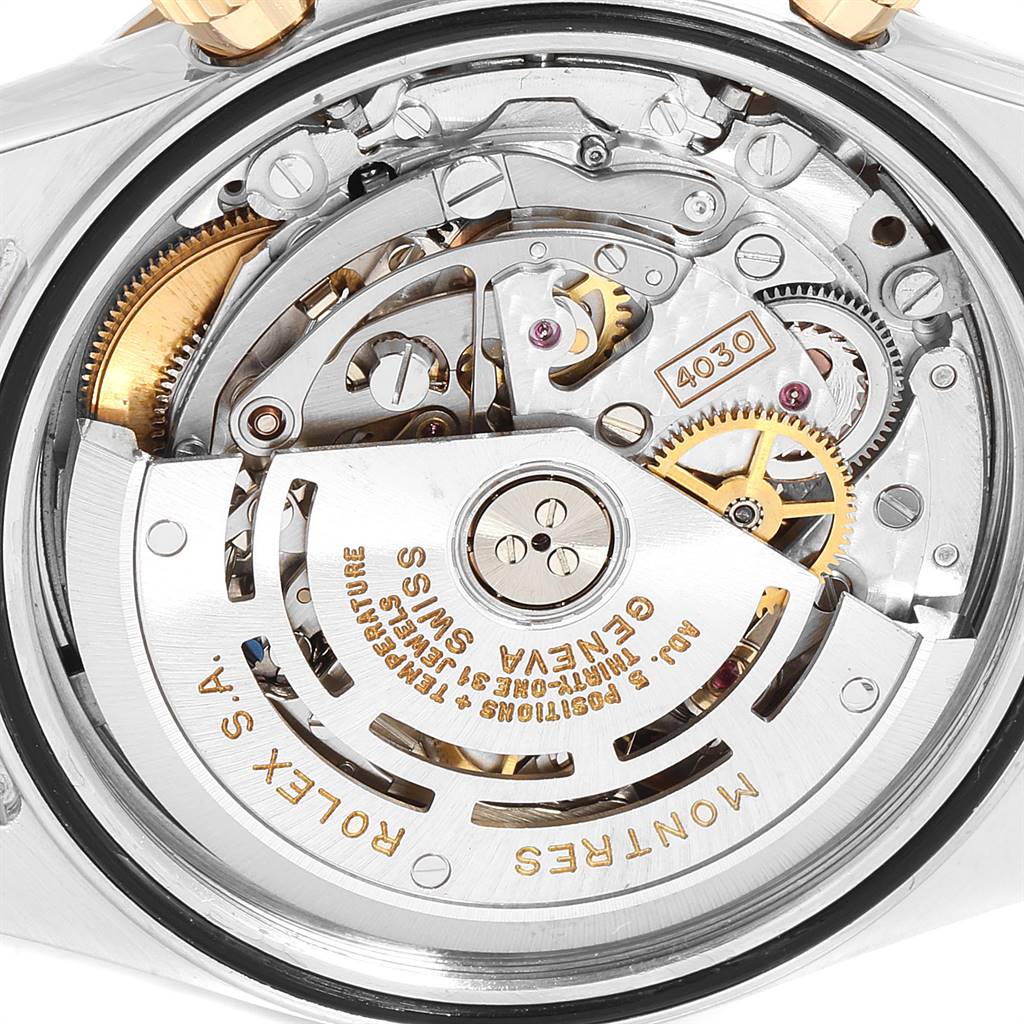 This image shows the inner mechanics and movement components of the Rolex Daytona 16523 Men's Steel and Gold (two tone) Champagne Dial 16523 Men's Steel and Gold (two tone) Champagne Dial watch model.