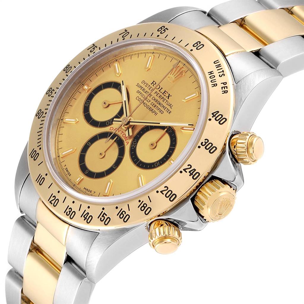 The image shows a close-up side angle of the Rolex Daytona 16523 Men's Steel and Gold (two tone) Champagne Dial 16523 Men's Steel and Gold (two tone) Champagne Dial watch, highlighting the bezel, dial, crown, and bracelet.