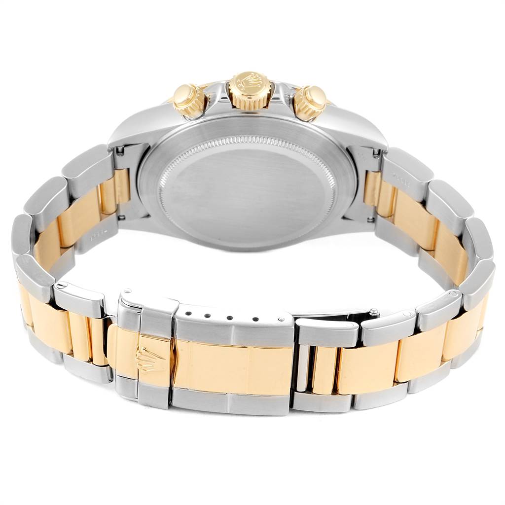 The image shows the back of the Rolex Daytona 16523 Men's Steel and Gold (two tone) Champagne Dial 16523 Men's Steel and Gold (two tone) Champagne Dial watch focusing on the bracelet and clasp.