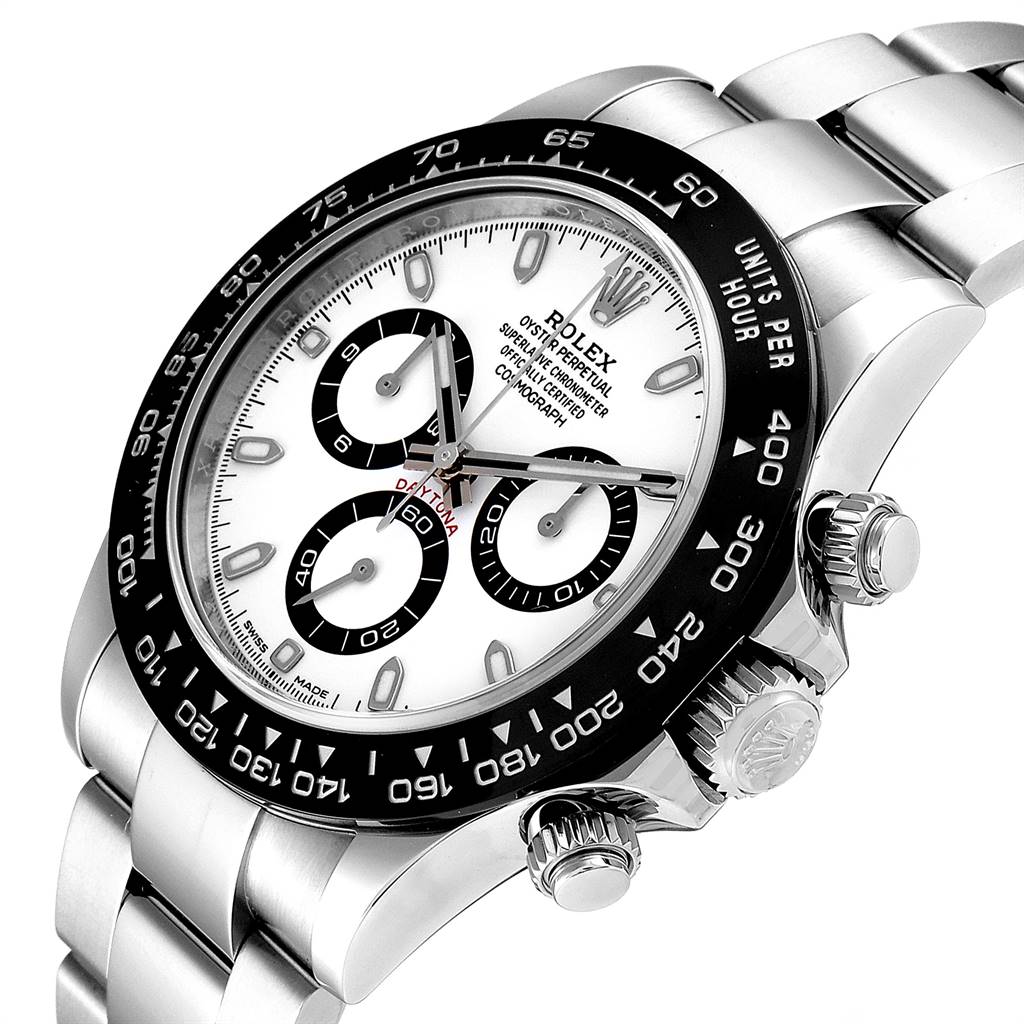 The image shows a Rolex Daytona 116500 Men's Stainless Steel White Dial 116500 Men's Stainless Steel White Dial watch from a three-quarter angle, highlighting its dial, bezel, and side crown.