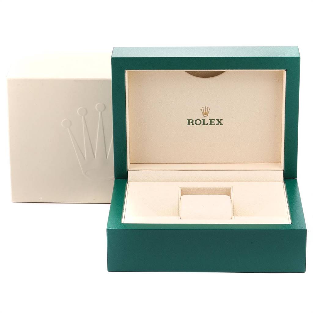 The image displays an empty green and beige Rolex Daytona 116500 Men's Stainless Steel White Dial 116500 Men's Stainless Steel White Dial watch box shown from the front angle, with the Rolex logo inside.