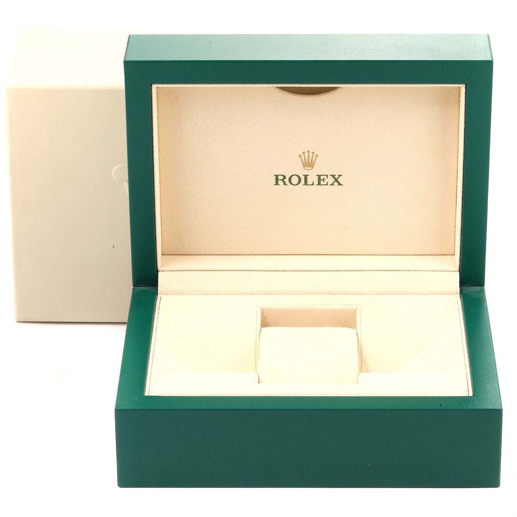 The image shows an open Rolex watch box for the Daytona model, viewed from the front.
