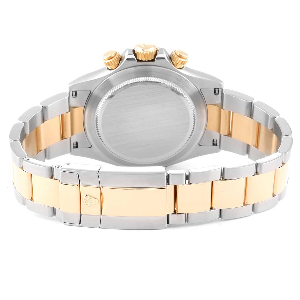 This image shows the backside and bracelet of a Rolex Daytona 116523 Men's Steel and Gold (two tone) Black Dial 116523 Men's Steel and Gold (two tone) Black Dial watch, highlighting its clasp and gold accents.