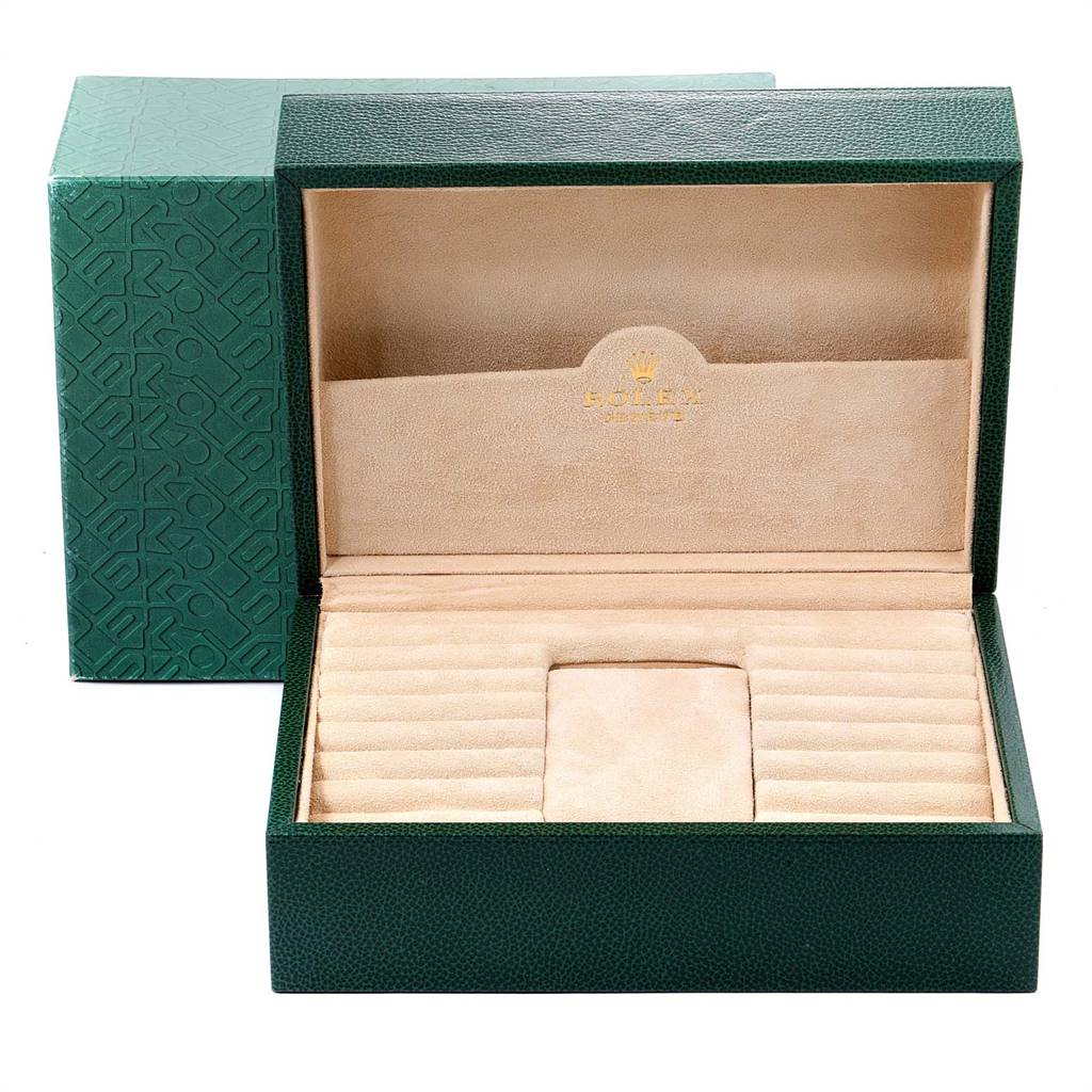 This image shows an empty green and beige Rolex Daytona 16518 Men's Yellow Gold White Dial 16518 Men's Yellow Gold White Dial watch box, viewed from the front with the lid open.