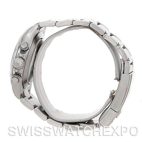 The image shows a side view of a Rolex Daytona 116520 Men's Stainless Steel Black Dial 116520 Men's Stainless Steel Black Dial watch, highlighting the crown, pushers, and bracelet links.