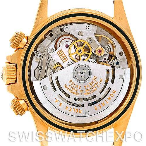This image shows the open case back view of a Rolex Daytona 16528 Men's Yellow Gold White Dial 16528 Men's Yellow Gold White Dial, revealing its intricate movement and inner mechanics.