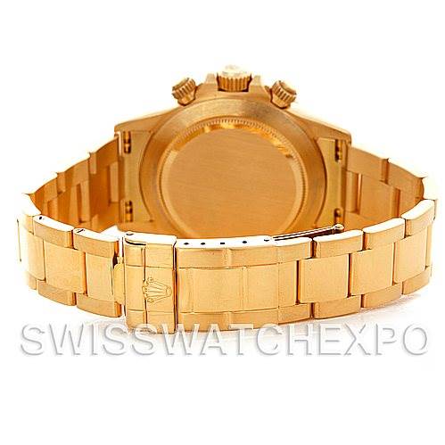 The image shows the back and bracelet of a gold Rolex Daytona 16528 Men's Yellow Gold White Dial 16528 Men's Yellow Gold White Dial watch from a rear angle.