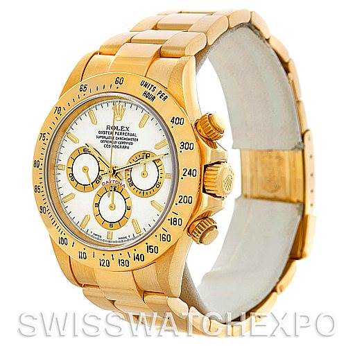 The Rolex Daytona 16528 Men's Yellow Gold White Dial 16528 Men's Yellow Gold White Dial watch is shown at a slight angle, displaying its full face, bezel, crown, pushers, and bracelet.