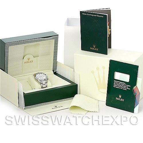 The image shows a Rolex Daytona 116520 Men's Stainless Steel White Dial 116520 Men's Stainless Steel White Dial watch with its accessories, including the box, manuals, warranty card holder, and cleaning cloth.
