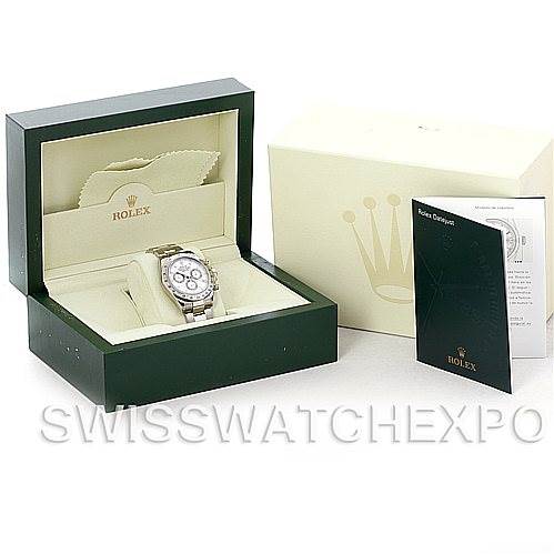 The image shows a Rolex Daytona 116520 Men's Stainless Steel White Dial 116520 Men's Stainless Steel White Dial watch in its open box alongside the outer box and a booklet, viewed from a front angle.
