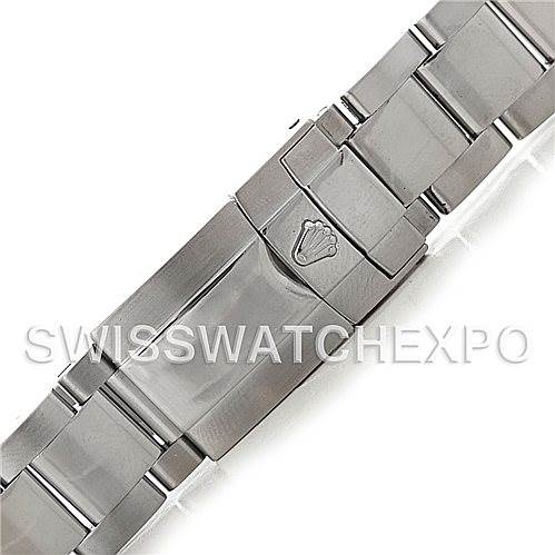 This image shows a close-up of the stainless steel bracelet clasp of a Rolex Daytona 116520 Men's Stainless Steel White Dial 116520 Men's Stainless Steel White Dial watch, featuring the Rolex logo.