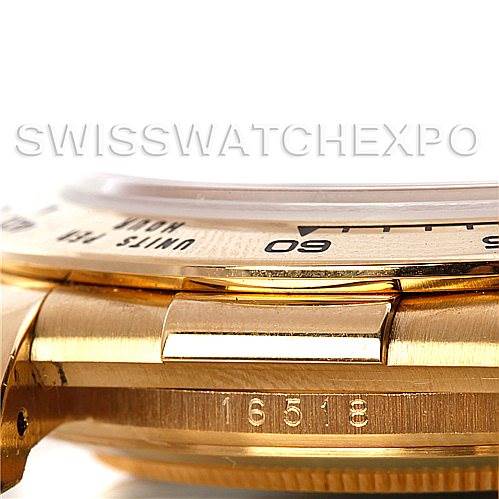 This image shows a close-up angle of the side of a Rolex Daytona 16518 Men's Yellow Gold White Dial 16518 Men's Yellow Gold White Dial watch, focusing on the bezel, case, and model number 16518.