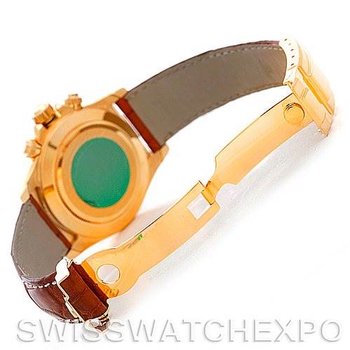 The image shows a Rolex Daytona 16518 Men's Yellow Gold White Dial 16518 Men's Yellow Gold White Dial watch from the backside, specifically highlighting the case back and clasp with a leather strap.