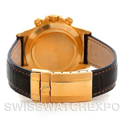 The image shows the Rolex Daytona 16518 Men's Yellow Gold White Dial 16518 Men's Yellow Gold White Dial watch from the back, highlighting its clasp and strap.