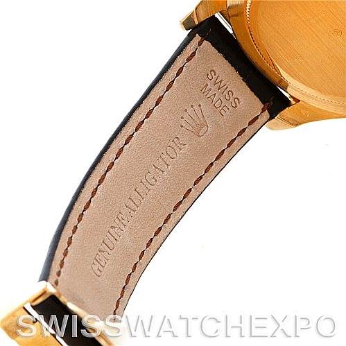 The image shows the inside of a leather strap and part of the watch case of a Rolex Daytona 16518 Men's Yellow Gold White Dial 16518 Men's Yellow Gold White Dial, emphasizing "Genuine Alligator" and "Swiss Made."