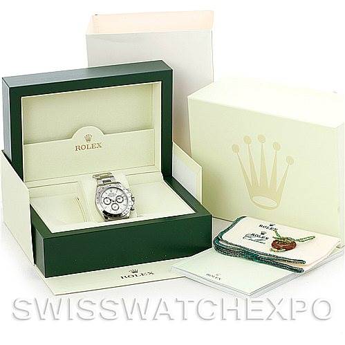 The image shows a Rolex Daytona 116520 Men's Stainless Steel White Dial 116520 Men's Stainless Steel White Dial watch in its box, with outer packaging, tags, and booklets included.