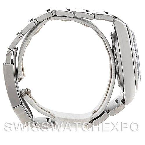 The image shows a side view of a Rolex Daytona 116520 Men's Stainless Steel Black Dial 116520 Men's Stainless Steel Black Dial watch, highlighting its profile and metal bracelet.