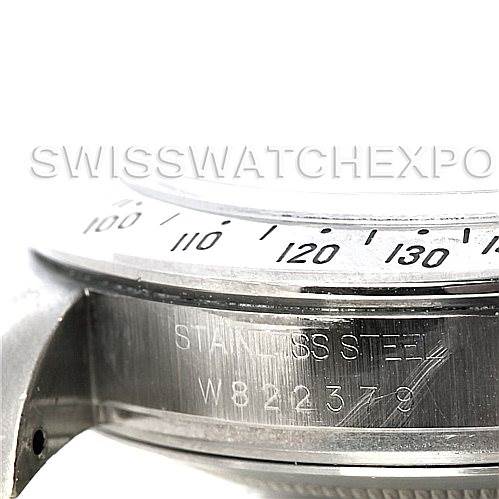 This image shows a close-up of the stainless steel case side, engraved with serial numbers and part of the bezel of a Rolex Daytona 16520 Men's Stainless Steel Black Dial 16520 Men's Stainless Steel Black Dial watch.