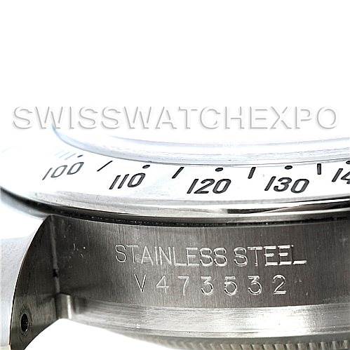 The image shows a close-up of the side profile of the bezel and the engraved serial number on a Rolex Daytona 116520 Men's Stainless Steel Black Dial 116520 Men's Stainless Steel Black Dial model watch.