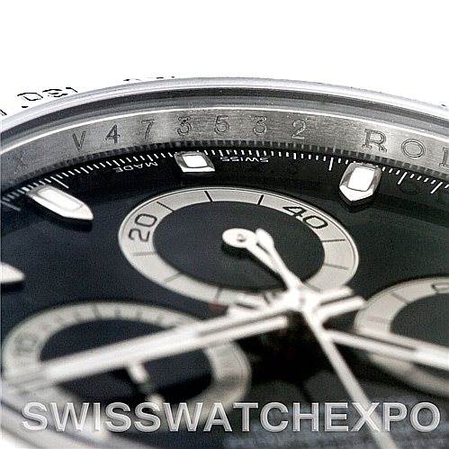 The image shows a close-up of the dial and bezel of a Rolex Daytona 116520 Men's Stainless Steel Black Dial 116520 Men's Stainless Steel Black Dial watch.