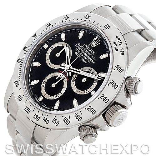 This image shows a close-up angled view of a Rolex Daytona 116520 Men's Stainless Steel Black Dial 116520 Men's Stainless Steel Black Dial watch, highlighting the bezel, crown, pushers, and part of the bracelet.