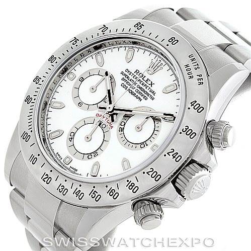 The Rolex Daytona 116520 Men's Stainless Steel White Dial 116520 Men's Stainless Steel White Dial watch is shown at a three-quarter angle, showcasing its white dial, tachymeter bezel, pushers, crown, and stainless steel bracelet.