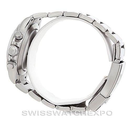 This image shows a side view of a Rolex Daytona 116520 Men's Stainless Steel White Dial 116520 Men's Stainless Steel White Dial watch, focusing on the case, bezel, and parts of the bracelet.