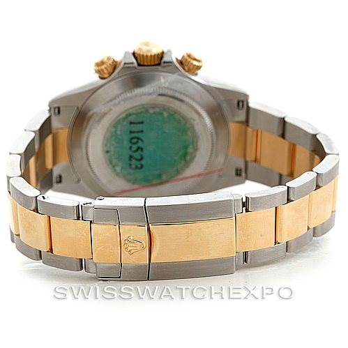 The image shows the back and bracelet of a Rolex Daytona 116523 Men's Steel and Gold (two tone) White Dial 116523 Men's Steel and Gold (two tone) White Dial watch, highlighting its two-tone metal design and clasp.