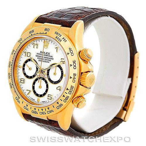 This image shows a Rolex Daytona 16518 Men's Yellow Gold White Dial 16518 Men's Yellow Gold White Dial watch at an angled view, highlighting its dial, bezel, crown, and leather strap.