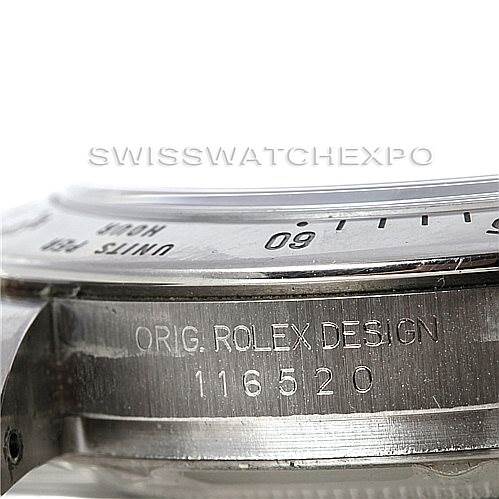 The image shows a side angle of a Rolex Daytona 116520 Men's Stainless Steel Black Dial 116520 Men's Stainless Steel Black Dial watch focusing on the engraved serial number and bezel.