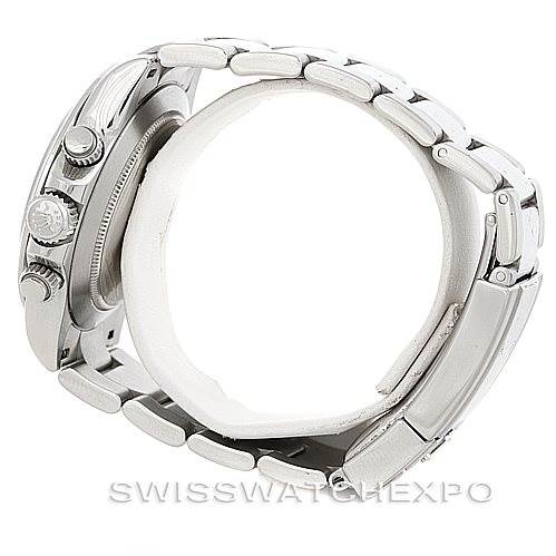 This image shows a side view of the Rolex Daytona 116520 Men's Stainless Steel White Dial 116520 Men's Stainless Steel White Dial watch, focusing on the crown, pushers, and stainless steel bracelet.