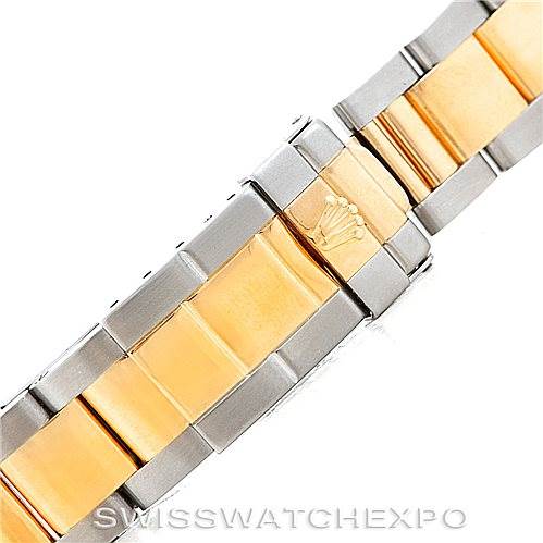 The image shows a close-up of the two-tone bracelet clasp of a Rolex Daytona 16523 Men's Steel and Gold (two tone) White Dial 16523 Men's Steel and Gold (two tone) White Dial watch.