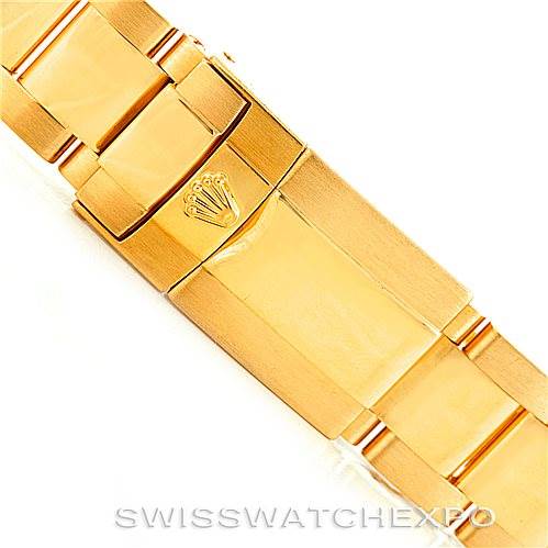 The image shows an angled view of the gold bracelet and clasp with the Rolex logo from a Rolex Daytona 116528 Men's Yellow Gold Black Dial 116528 Men's Yellow Gold Black Dial watch.