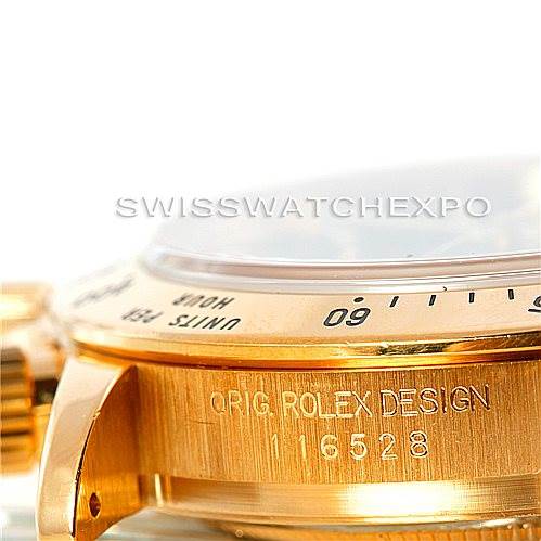 This close-up image of the Rolex Daytona 116528 Men's Yellow Gold Black Dial 116528 Men's Yellow Gold Black Dial watch shows the case side with the model number 116528 and part of the bezel.