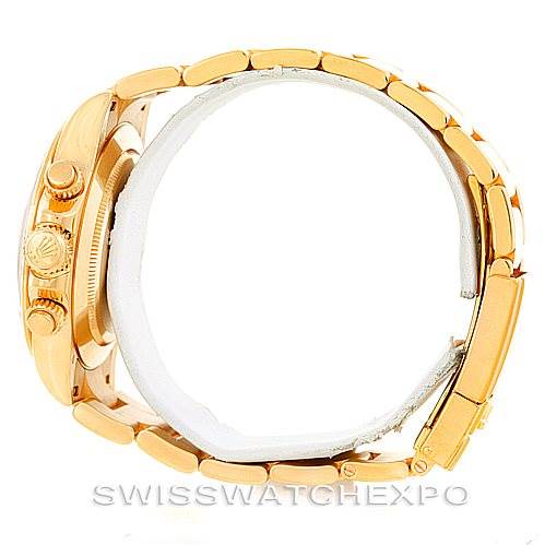 The image shows a side view of the Rolex Daytona 116528 Men's Yellow Gold Black Dial 116528 Men's Yellow Gold Black Dial, highlighting the crown, pushers, and bracelet.