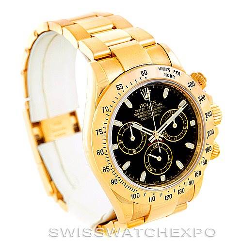 This image shows the Rolex Daytona 116528 Men's Yellow Gold Black Dial 116528 Men's Yellow Gold Black Dial watch at a three-quarter angle, highlighting the gold bracelet, black dial, and bezel.