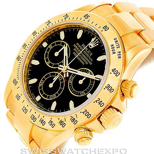 The image shows a Rolex Daytona 116528 Men's Yellow Gold Black Dial 116528 Men's Yellow Gold Black Dial watch with a gold bracelet and black dial, viewed from an angled top-front perspective.
