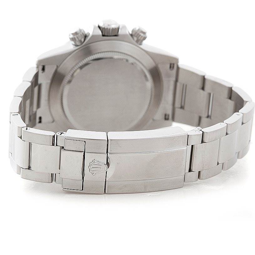 The image shows the backside of the Rolex Daytona 116520 Men's Stainless Steel White Dial 116520 Men's Stainless Steel White Dial watch, including its clasp, bracelet, and case back.