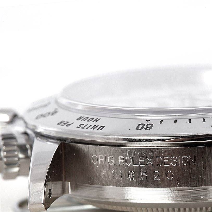This image shows a close-up side view of the Rolex Daytona 116520 Men's Stainless Steel White Dial 116520 Men's Stainless Steel White Dial watch displaying the bezel, crown, and "ORIG ROLEX DESIGN" with model number 116520.