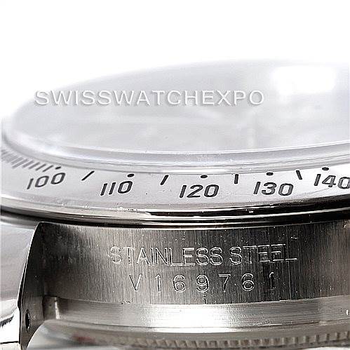 The image shows a close-up, angled side view of the bezel and part of the stainless steel case of a Rolex Daytona 116520 Men's Stainless Steel Black Dial 116520 Men's Stainless Steel Black Dial watch.