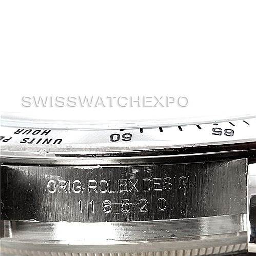 The image shows a close-up view of the side of a Rolex Daytona 116520 Men's Stainless Steel Black Dial 116520 Men's Stainless Steel Black Dial watch, focusing on the bezel's edge and the engraved case.