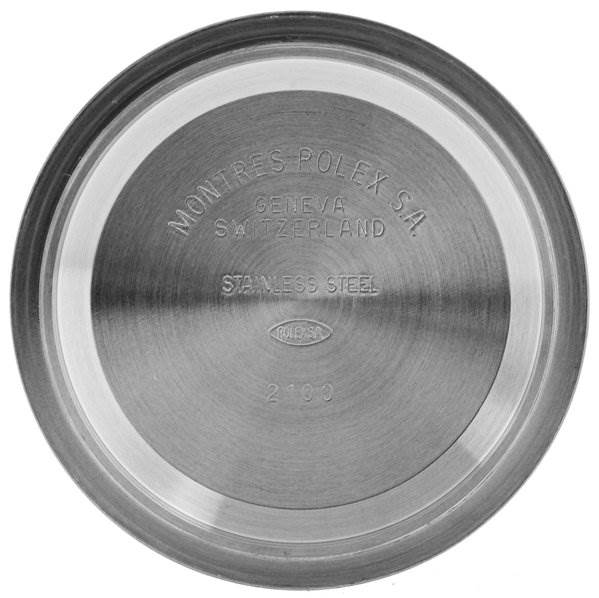 The image shows the stainless steel case back of a Rolex Daytona 116523 Men's Stainless Steel Black Dial 116523 Men's Stainless Steel Black Dial watch, viewed from above.