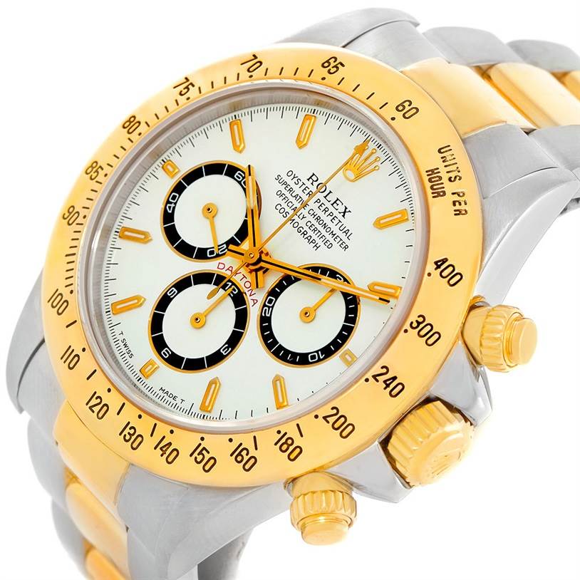 The Rolex Daytona 16523 Men's Steel and Gold (two tone) White Dial 16523 Men's Steel and Gold (two tone) White Dial watch is shown at an angled close-up, highlighting the dial, bezel, and crown.