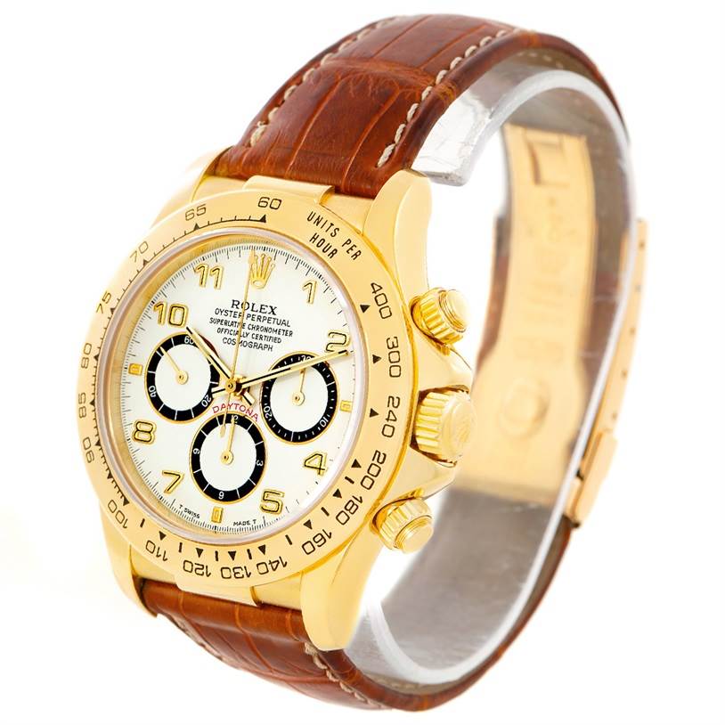 This image shows a Rolex Daytona 16518 Men's Yellow Gold White Dial 16518 Men's Yellow Gold White Dial watch angled from slightly above, highlighting its face, bezel, crown, and leather strap.